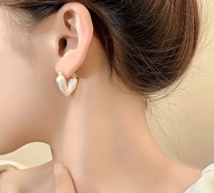 105. Lovely cream enamel heart earrings