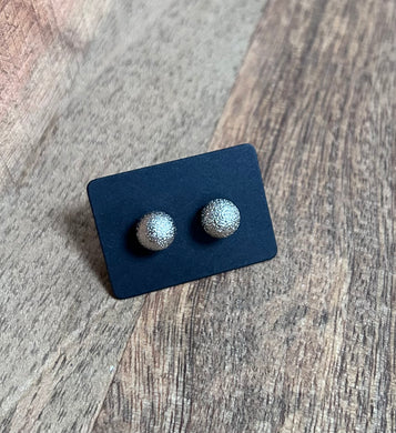 222. Pitted silver ball stud earrings