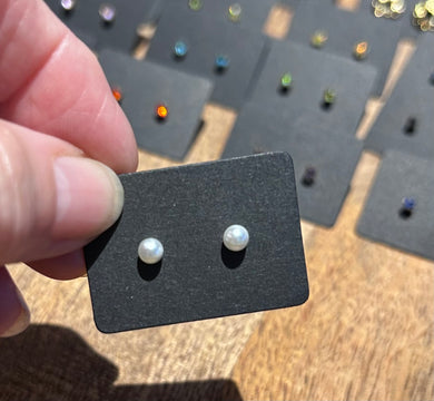 151. Super tiny imitation pearl stud earrings