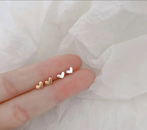 106. Super tiny gold heart stud earrings