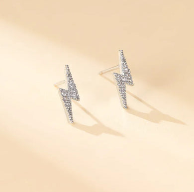 91. Tiny sparkly lightning bolt earrings in silver
