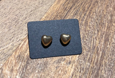 152. Chunky gold heart stud earrings