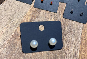 168. Imitation pearl stud earrings