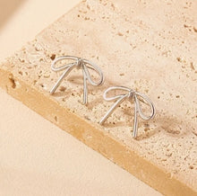 Load image into Gallery viewer, 111. Bow stud earrings in silver