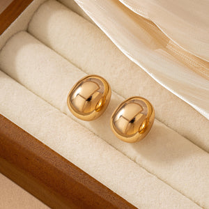 123. Boulders of gold stud earrings